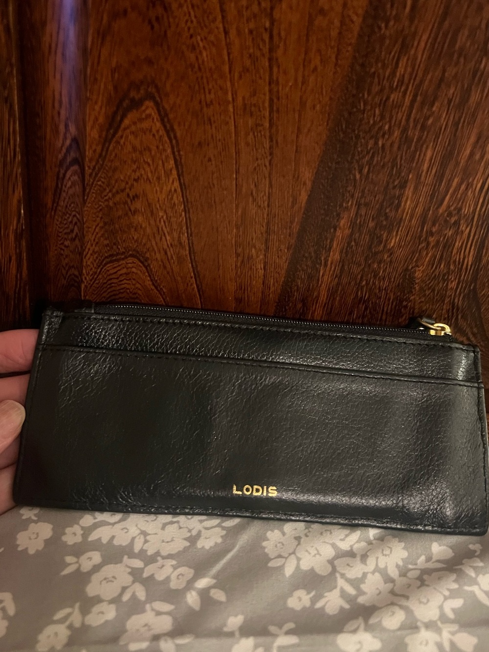 Lodis 100% Black Leather, 8 card slots, very good condition